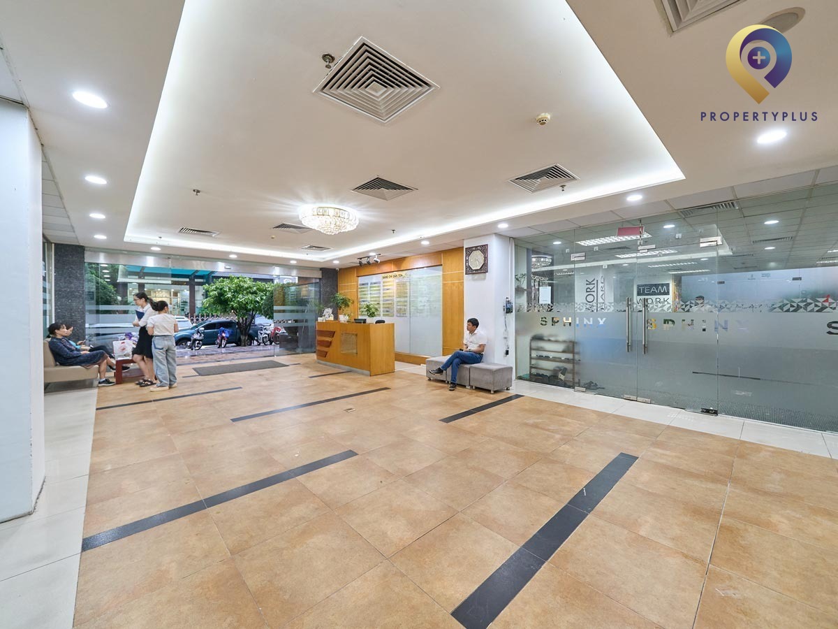 Reception lobby area of Hoang Linh Building with seating and reception desk